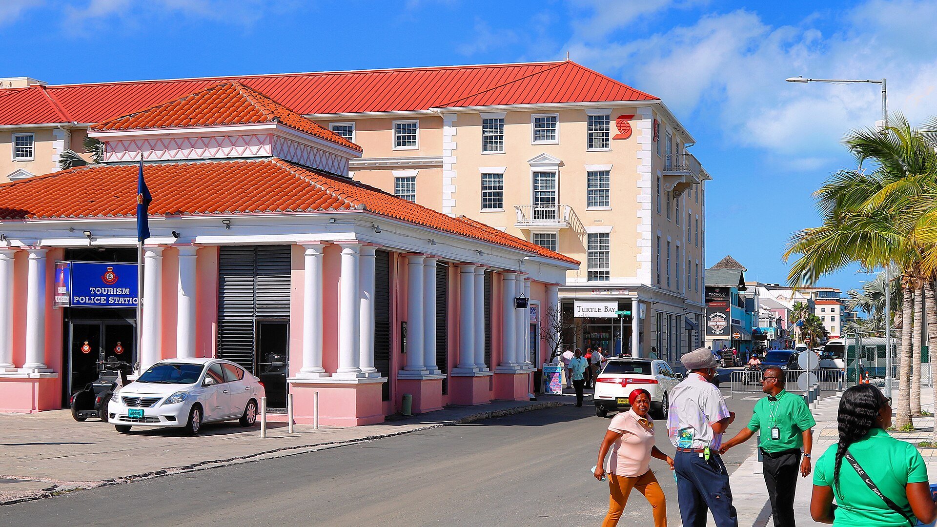 Woodes Rogers Walk in downtown Nassau with a tourism police station and a bank building