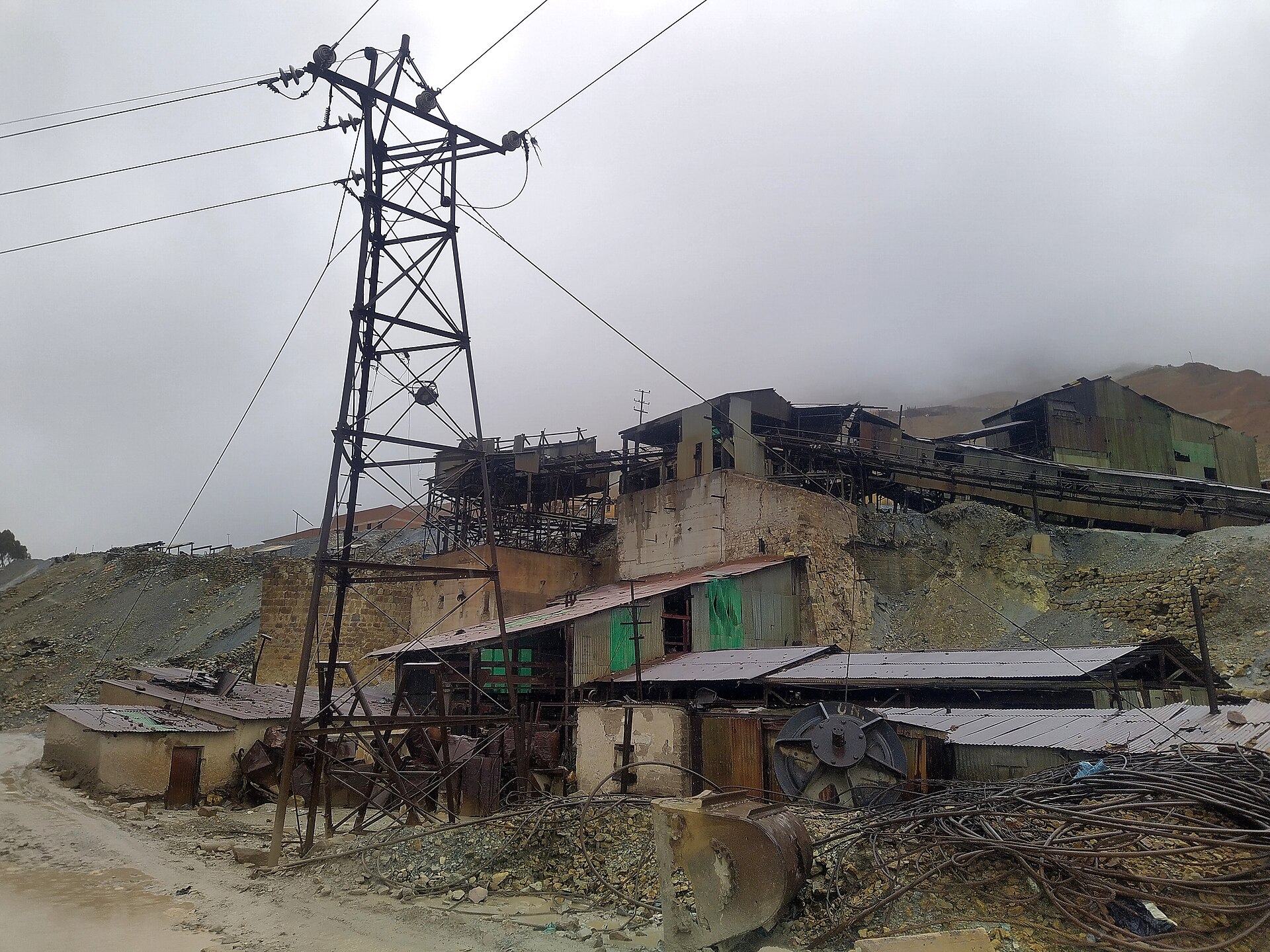 A steel power pylon beside an abandoned mining plant in Potosí, Bolivia
