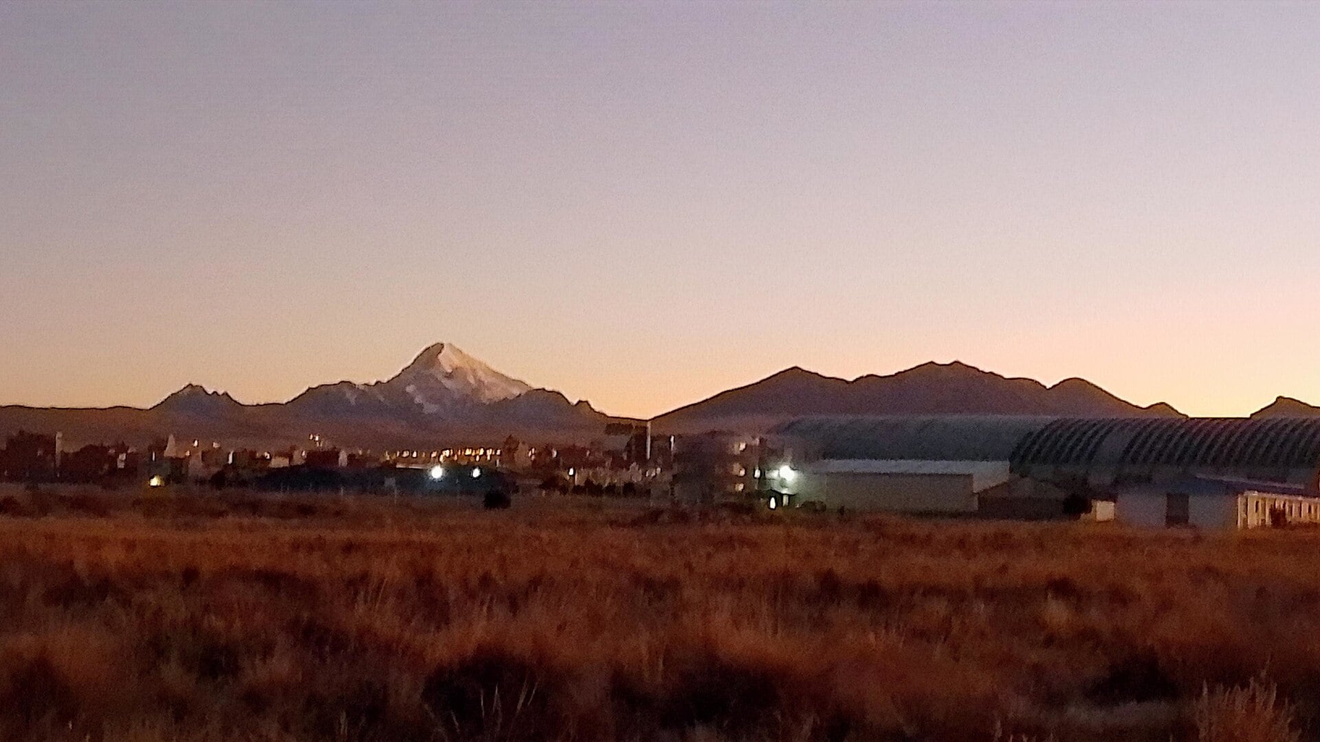 Sunrise at El Alto International Airport with Huayna Potosí in the distance, Bolivia