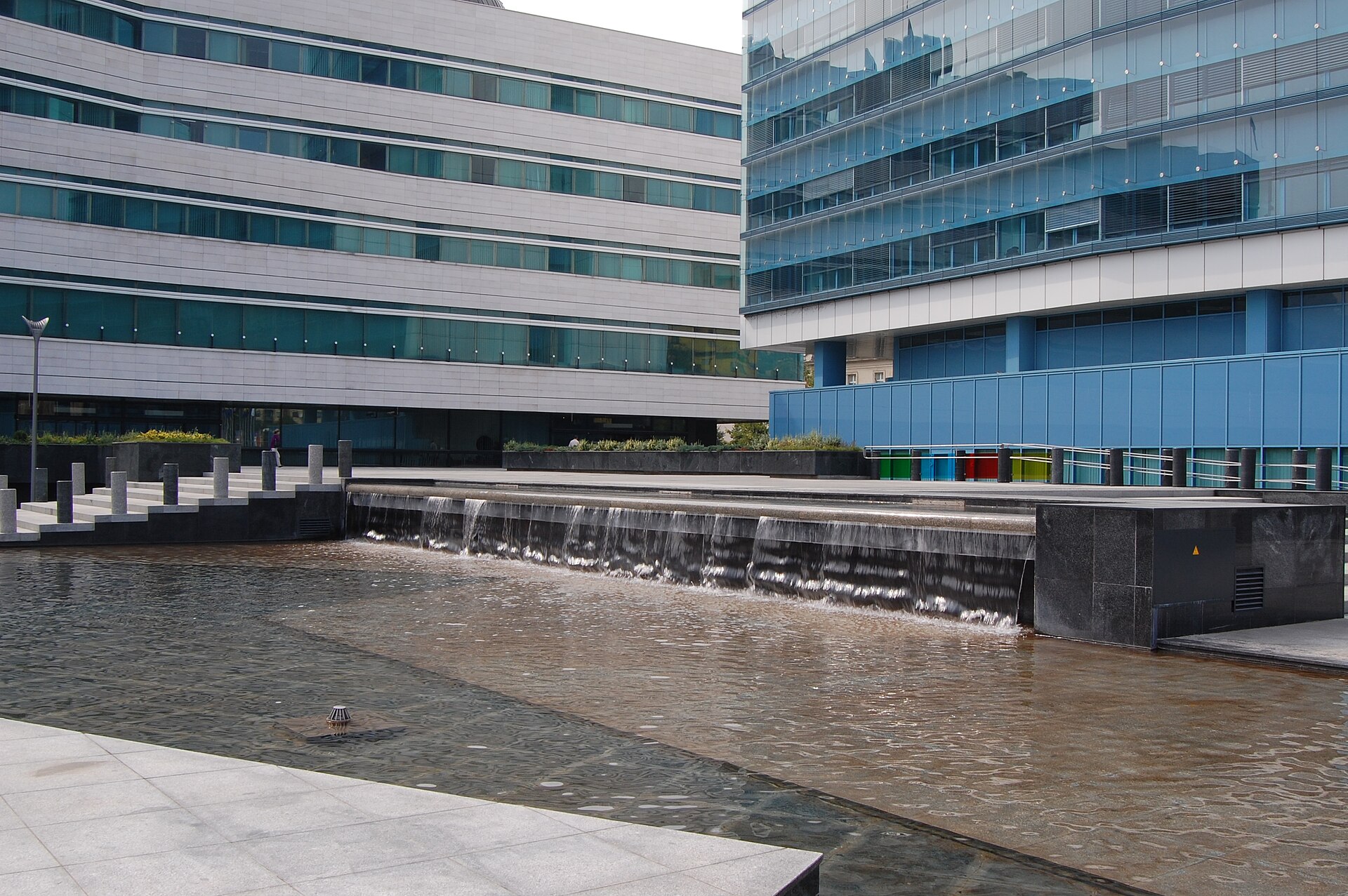 Government buildings and a fountain in Sarajevo, including the glass tower of the state institutions