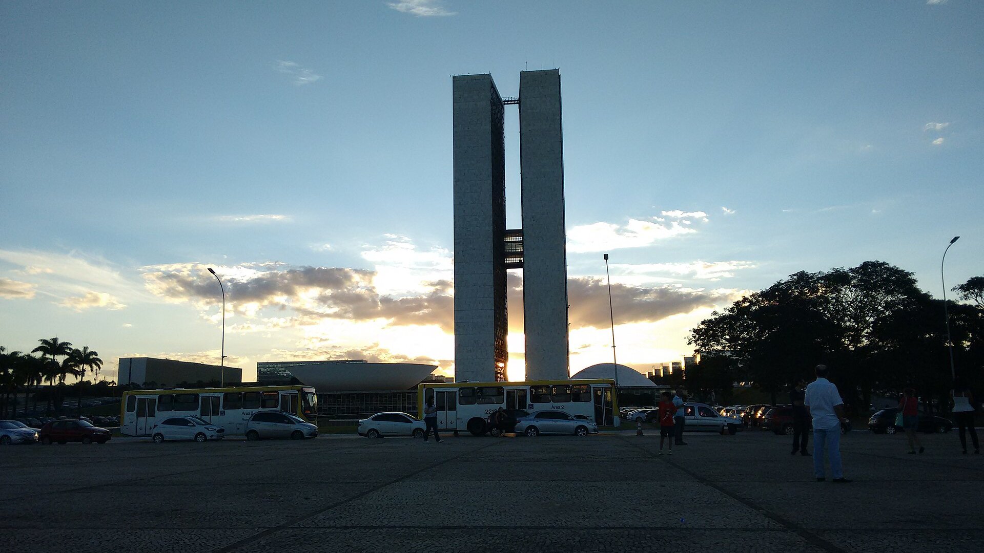 National Congress twin towers and two domes in Brasília at sunset, seen from Three Powers Square