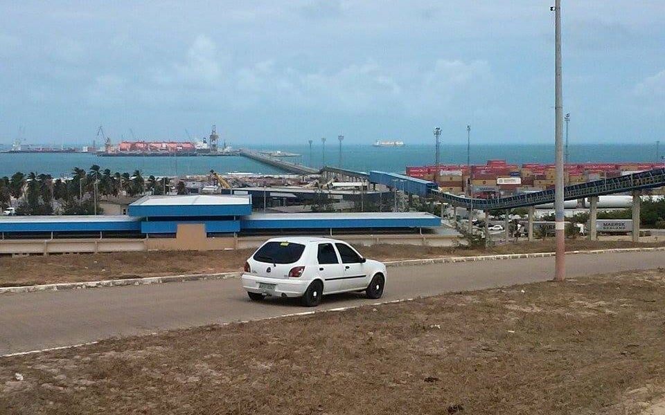 The Pecém port and industrial complex in Ceará, Brazil, with container yards and a pier