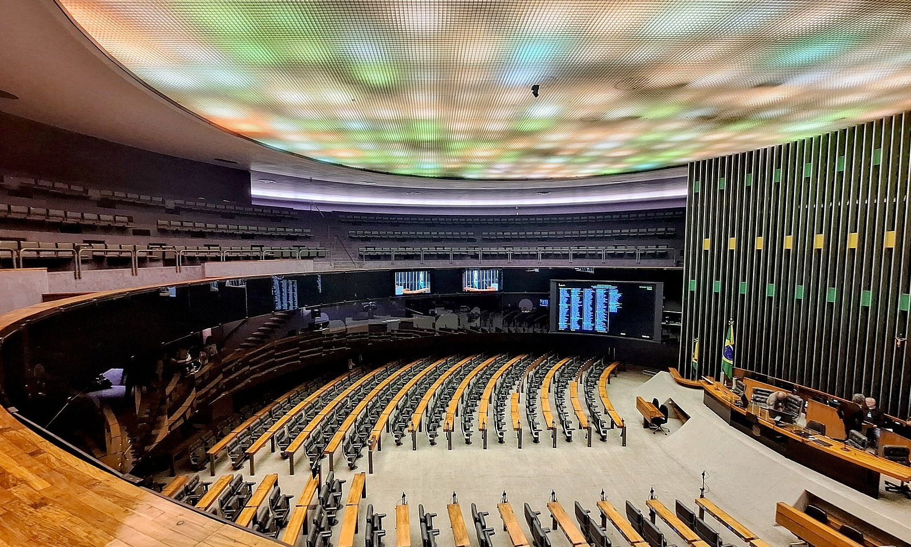 Interior of the Ulysses Guimarães plenary of Brazil's Chamber of Deputies in Brasília, seen from the gallery, with the Brazilian flag