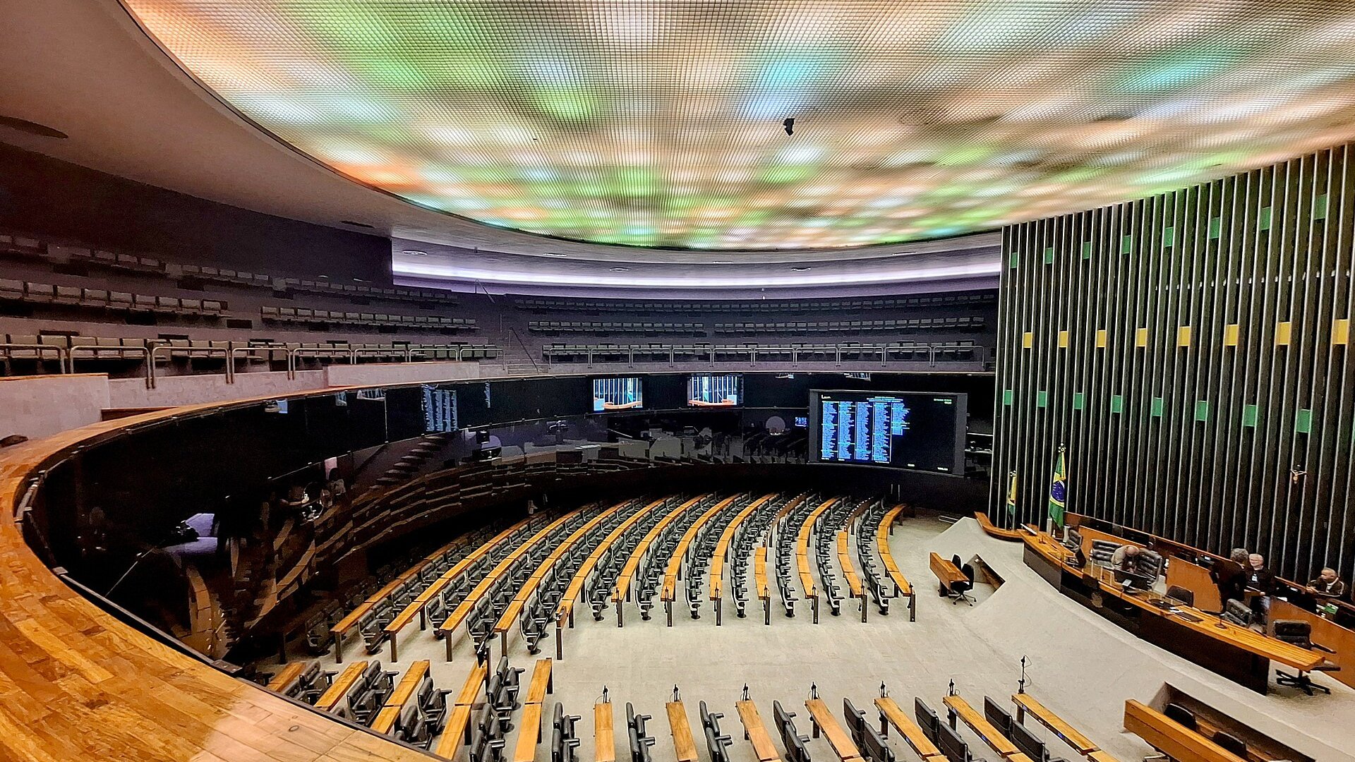 Interior of the Ulysses Guimarães plenary of Brazil's Chamber of Deputies in Brasília, seen from the gallery, with the Brazilian flag