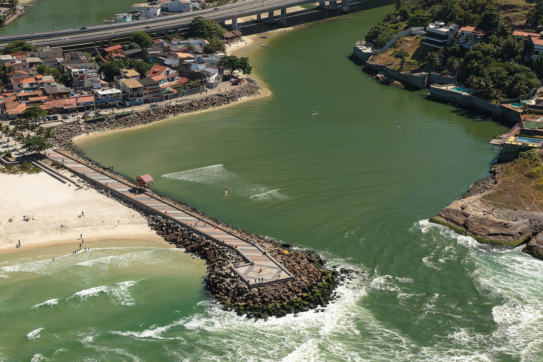 Aerial view of the Quebra-Mar breakwater at the mouth of the Joatinga channel in Barra da Tijuca, Rio de Janeiro
