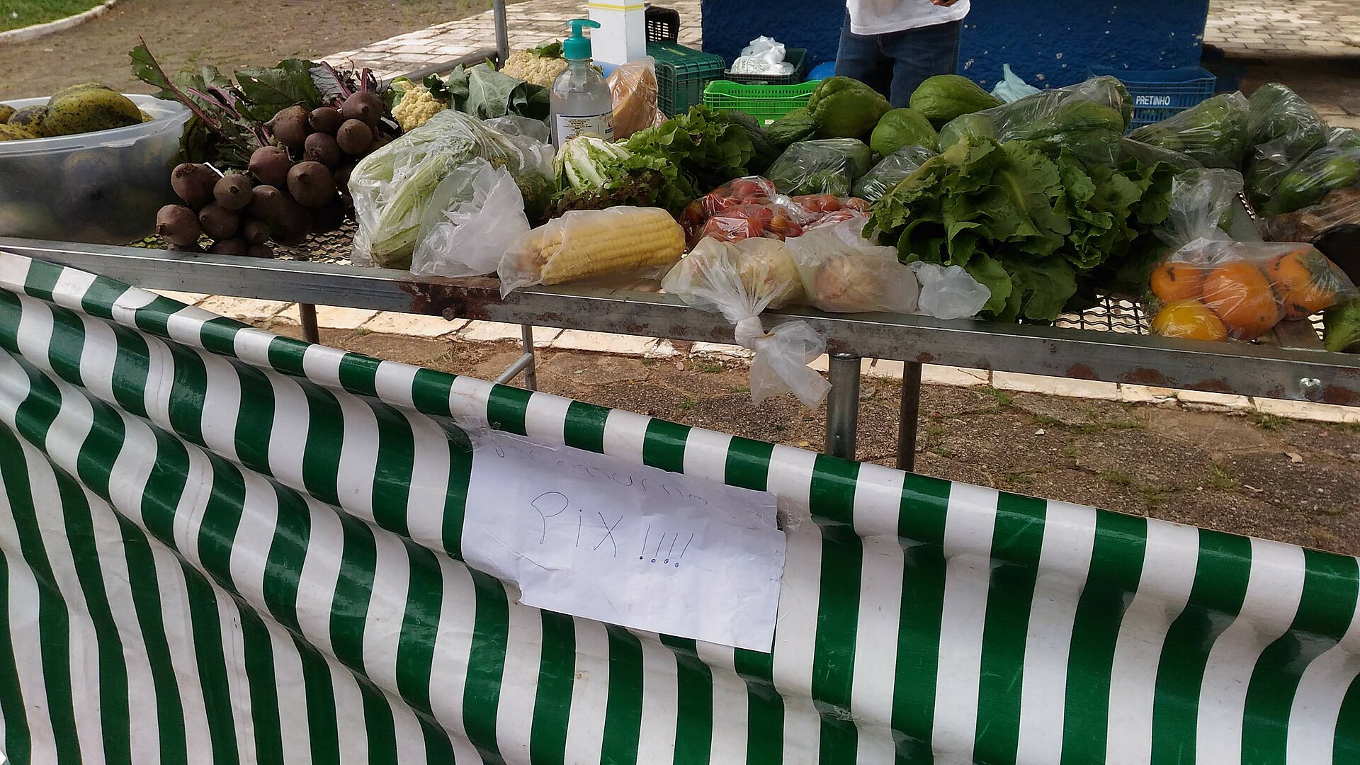 A produce stall at a street market in Itaj&uacute;ba, Minas Gerais, Brazil, with a handwritten sign saying Pix