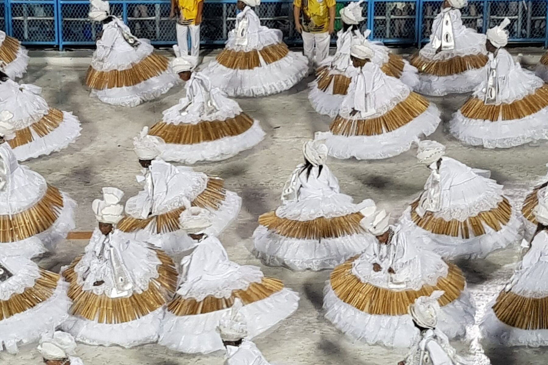 Brazil culture: baianas of the Acadêmicos da Rocinha samba school parade at the Sambódromo in Rio de Janeiro