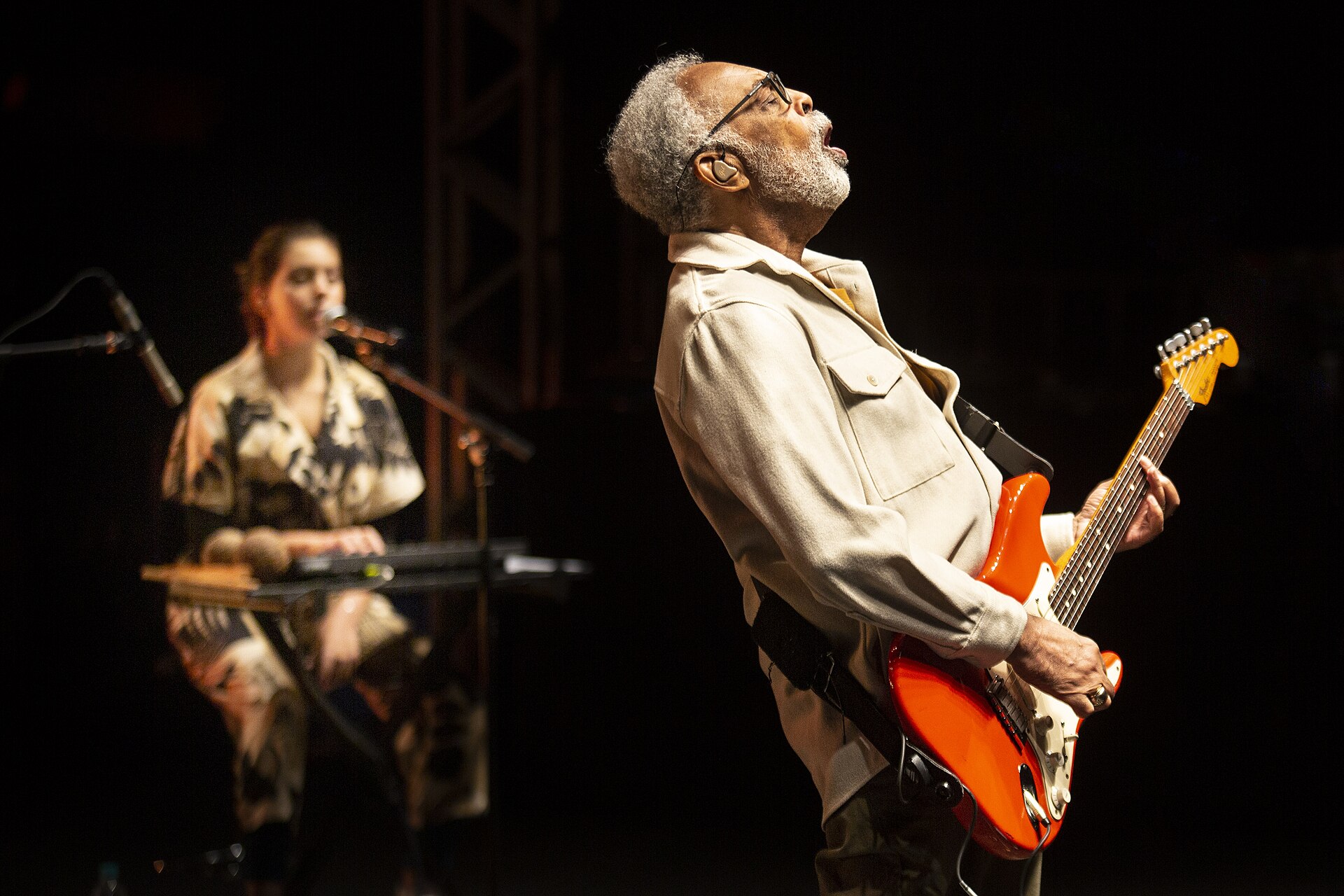 Brazil culture figure Gilberto Gil playing electric guitar on stage in Belo Horizonte