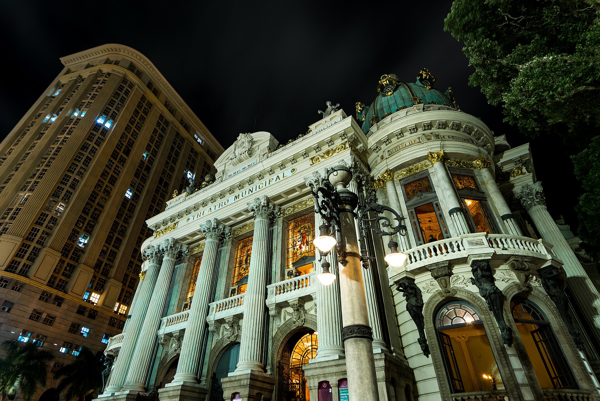Brazil culture landmark: the Theatro Municipal in central Rio de Janeiro lit up at night