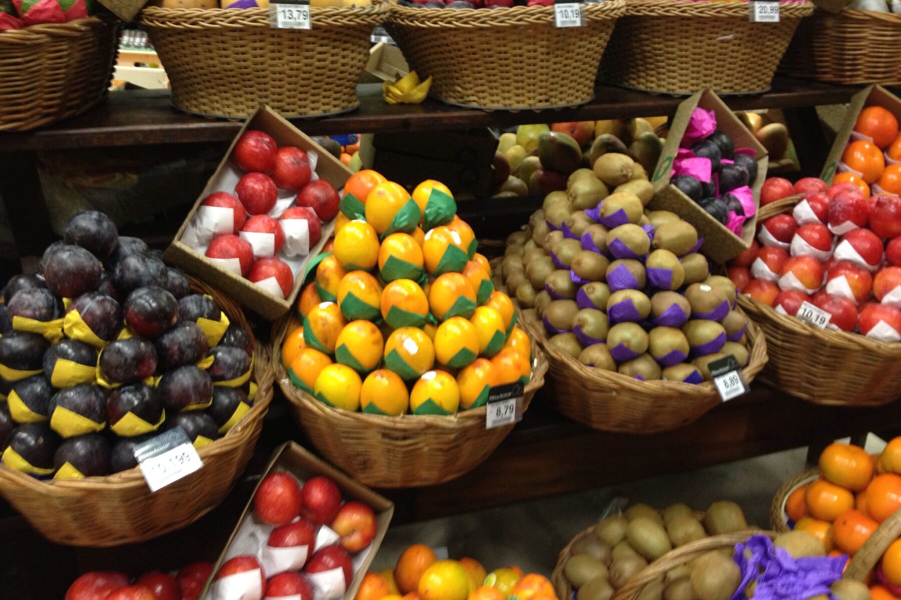 Baskets of fruit for sale at a market stall in São Paulo, Brazil
