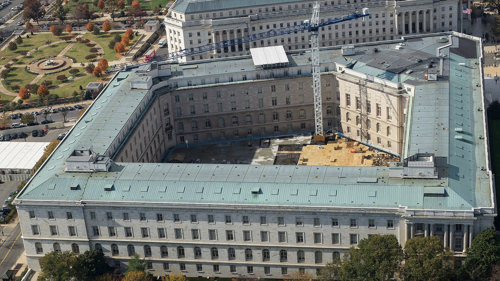 Aerial view of the Cannon House Office Building on Capitol Hill in Washington, with a construction crane in the courtyard