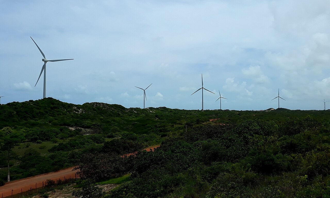 Wind turbines of the Arizona I wind farm on green scrubland in Rio do Fogo, Rio Grande do Norte, Brazil