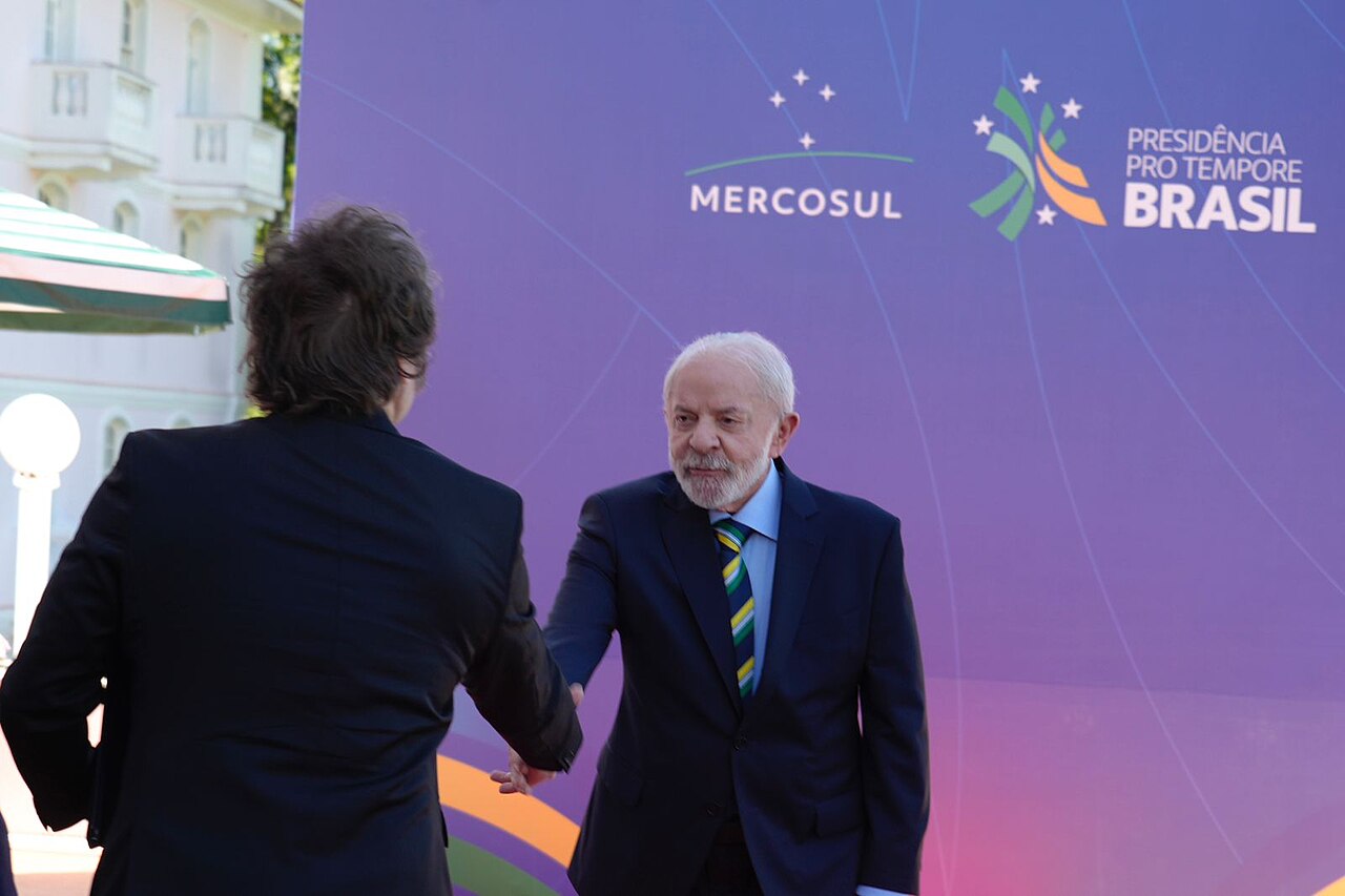 Brazil's President Lula shakes hands with Argentina's President Javier Milei at a Mercosur summit hosted by Brazil