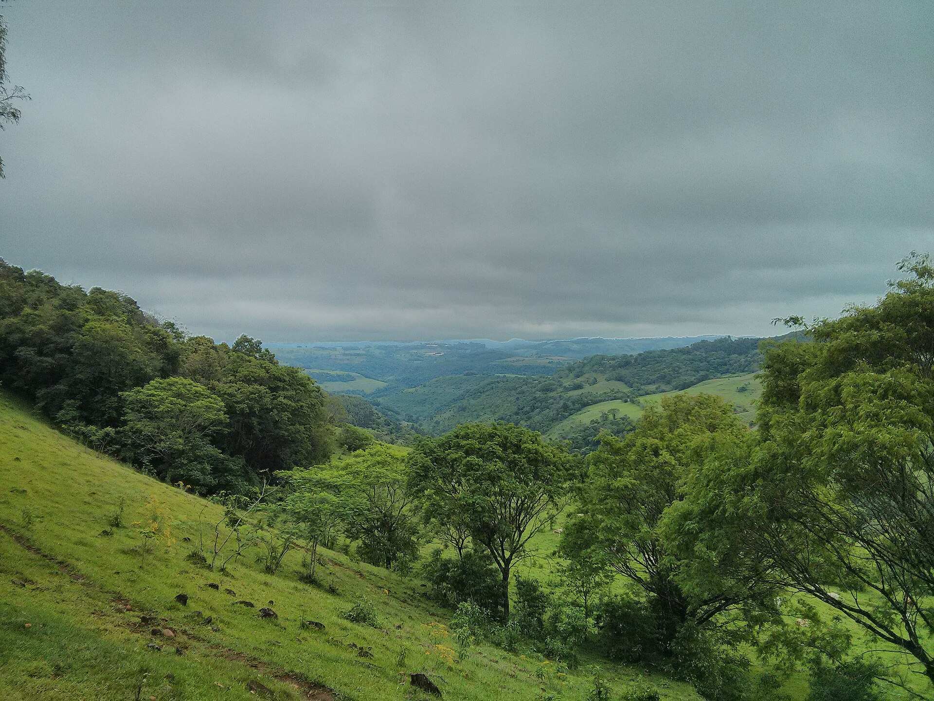 Green hills under cloud in rural Belmonte, Santa Catarina, Brazil