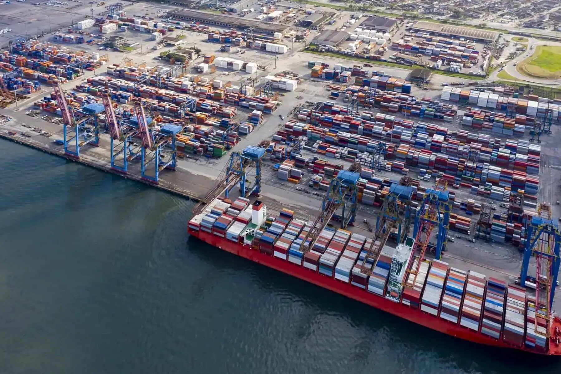 Aerial view of a container ship and cranes at the Port of Santos, Brazil