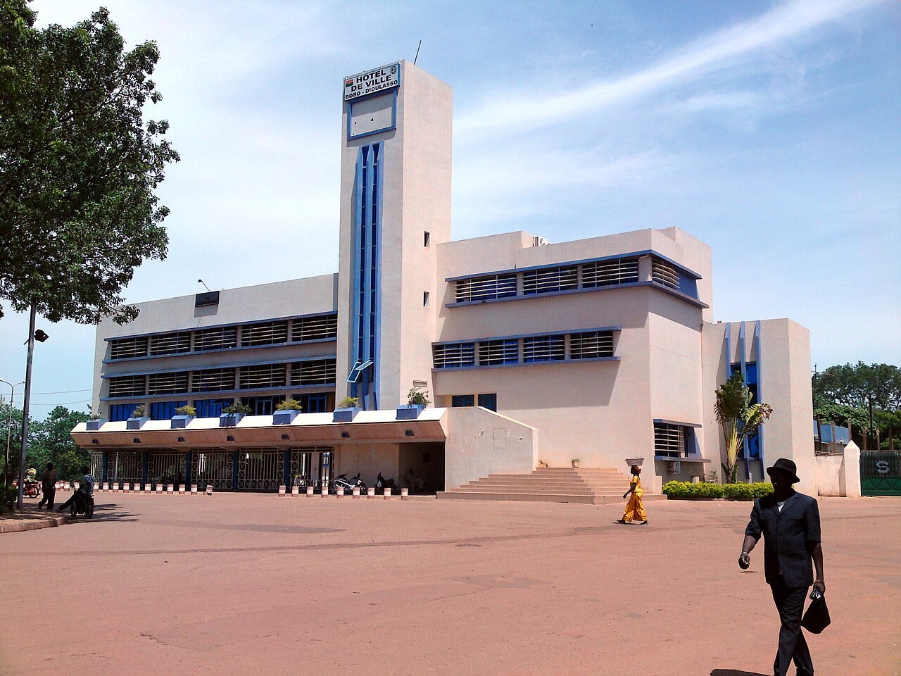 Town hall of Bobo-Dioulasso, Burkina Faso, a white building with a tall tower and blue window frames