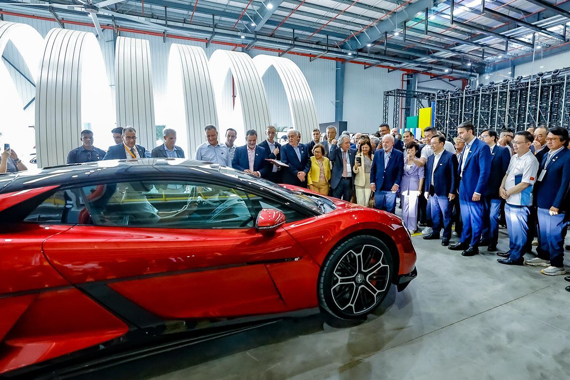 A red BYD sports car on display to guests inside the BYD factory in Camaçari, Bahia state, Brazil