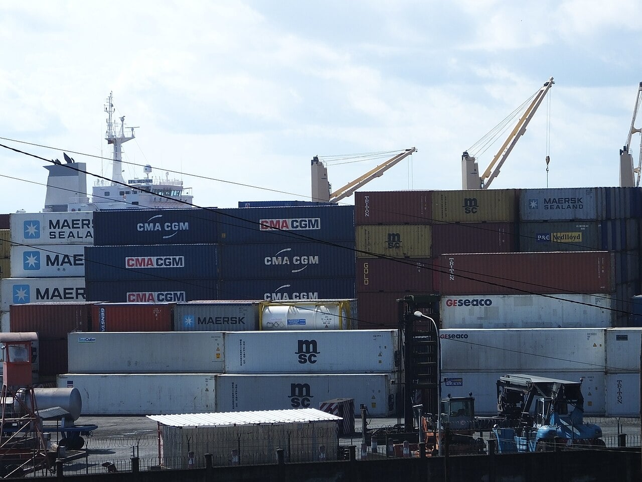 Stacked shipping containers and cranes at the port of Douala, Cameroon