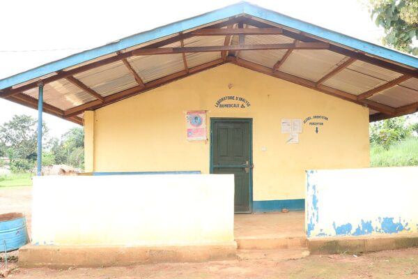 The biomedical laboratory building of a rural health centre in Boali, Central African Republic, with a blue-trimmed roof