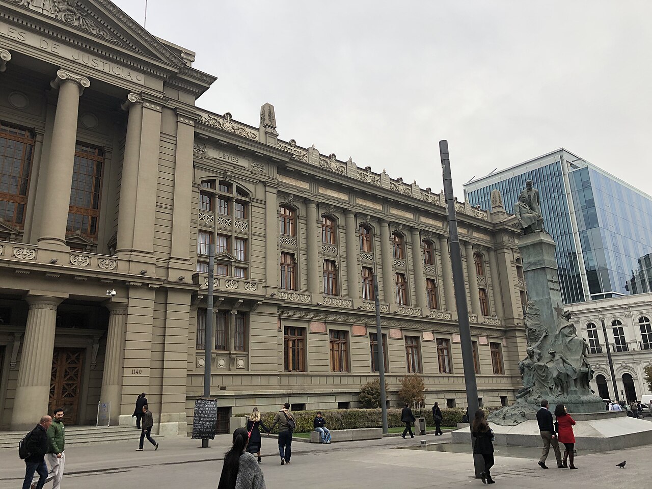 The Palace of Courts in Santiago, Chile, a stone building with columns, on a cloudy day