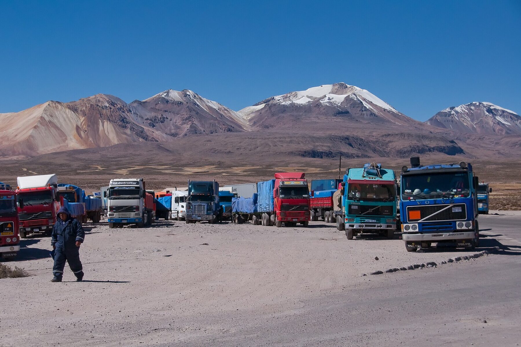 Cargo trucks parked at the Chungará–Tambo Quemado border crossing between Chile and Bolivia