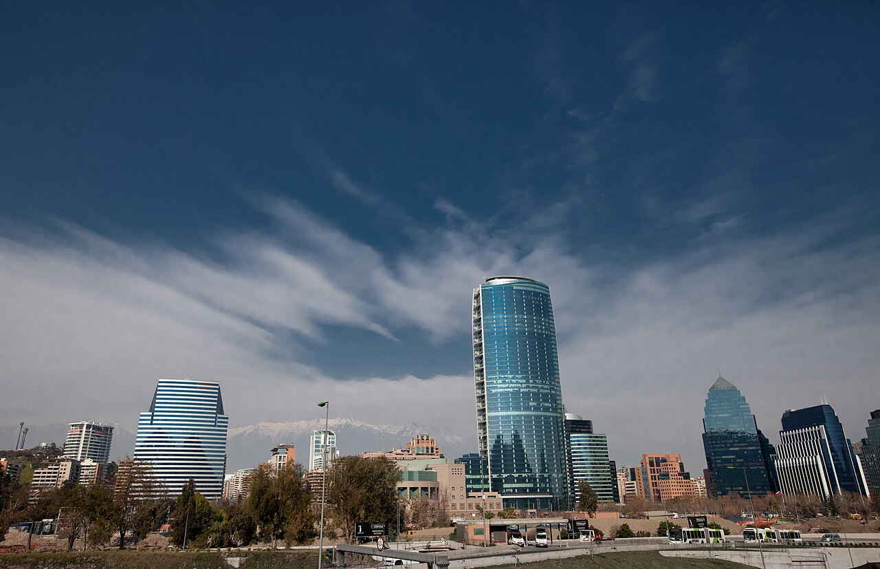 Glass office towers of Santiago's Sanhattan financial district with the snow-capped Andes behind