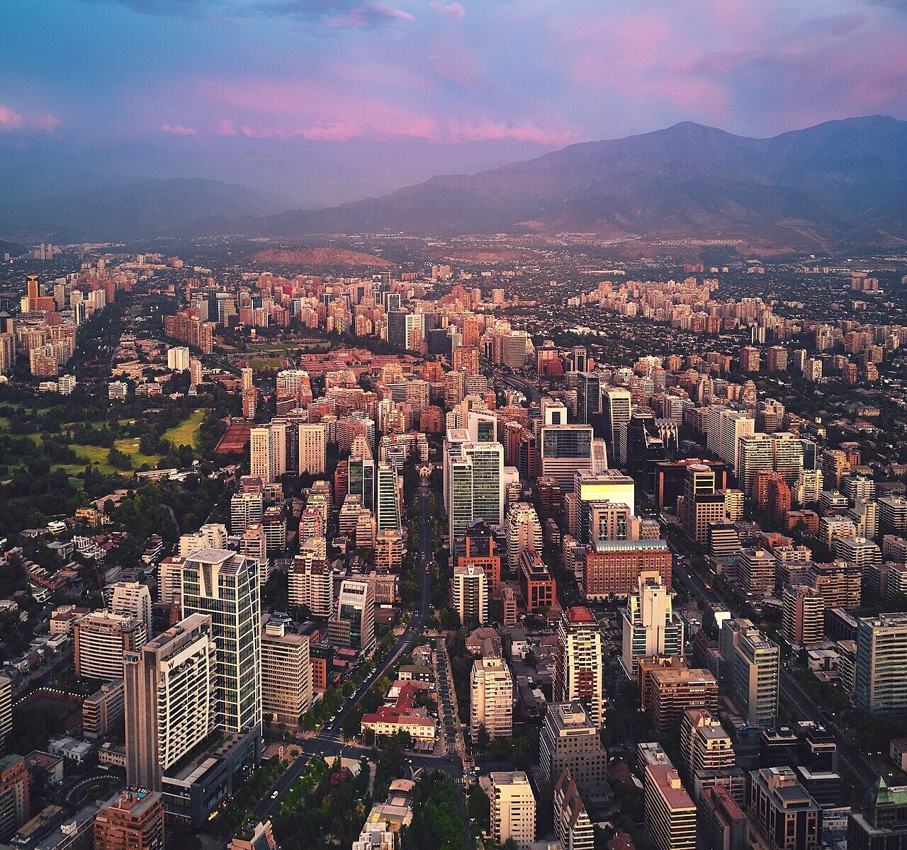 Aerial view of high-rise buildings in Las Condes, Santiago, with the Andes foothills behind