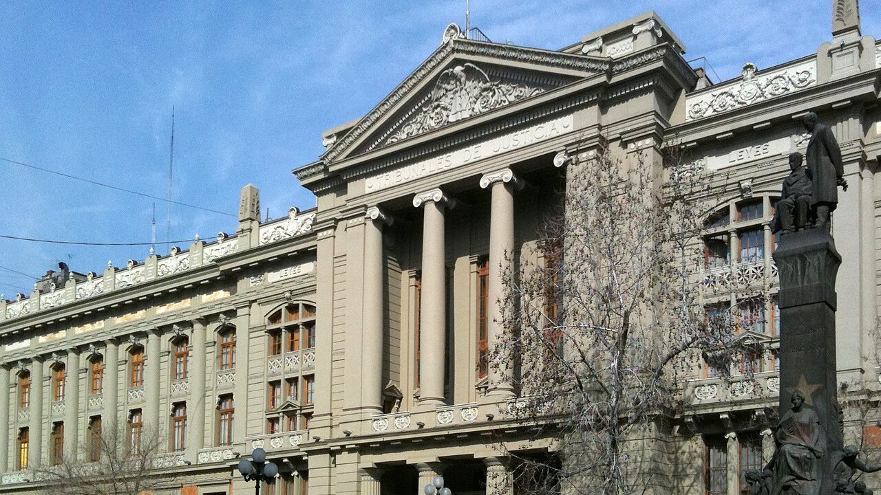 The columned entrance of the Palacio de los Tribunales de Justicia in Santiago, with the inscription Tribunales de Justicia on the pediment