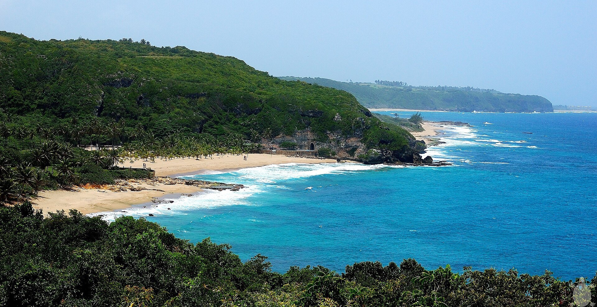 A beach with turquoise water on the west coast of Puerto Rico