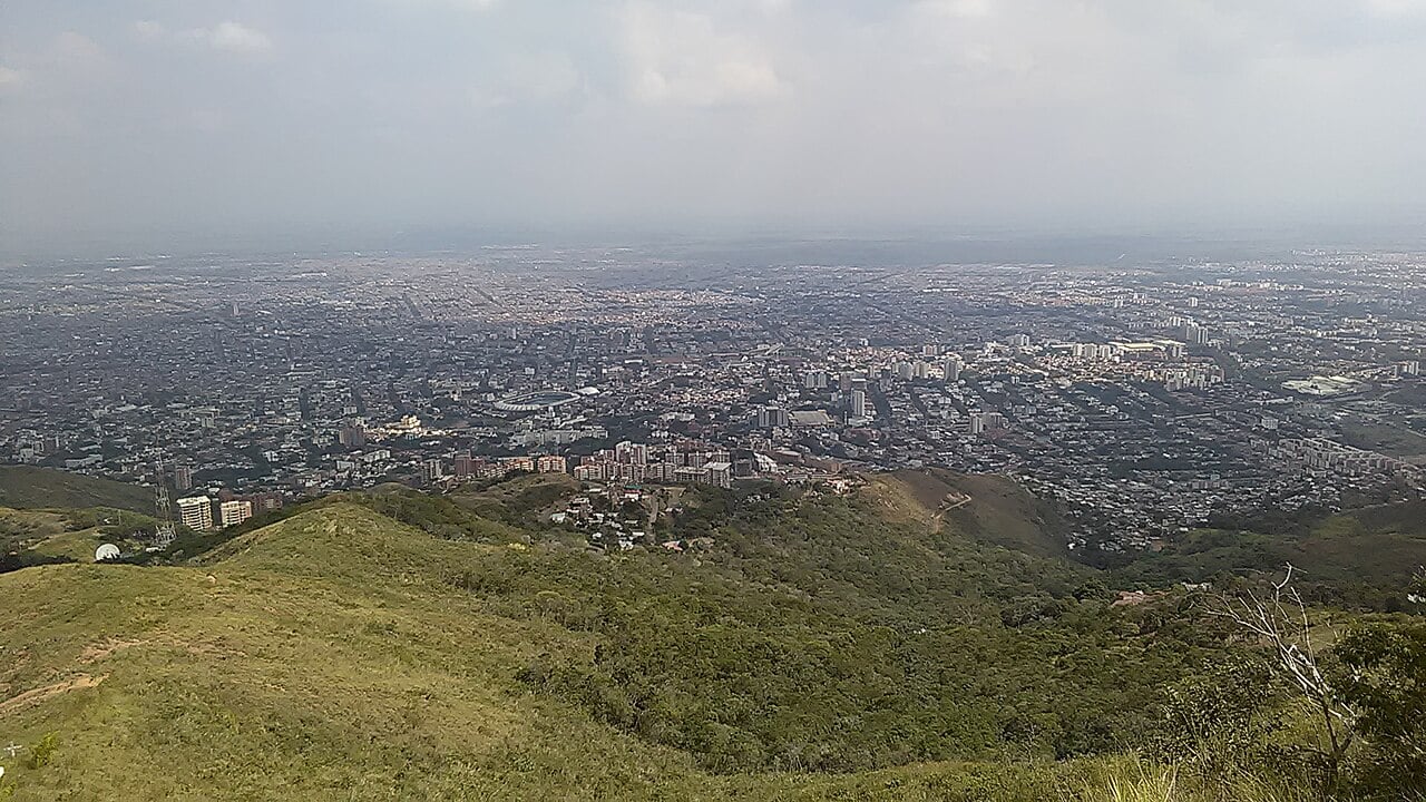 View over the city of Cali, Colombia, from a hillside, with the Valle del Cauca plain stretching to the horizon