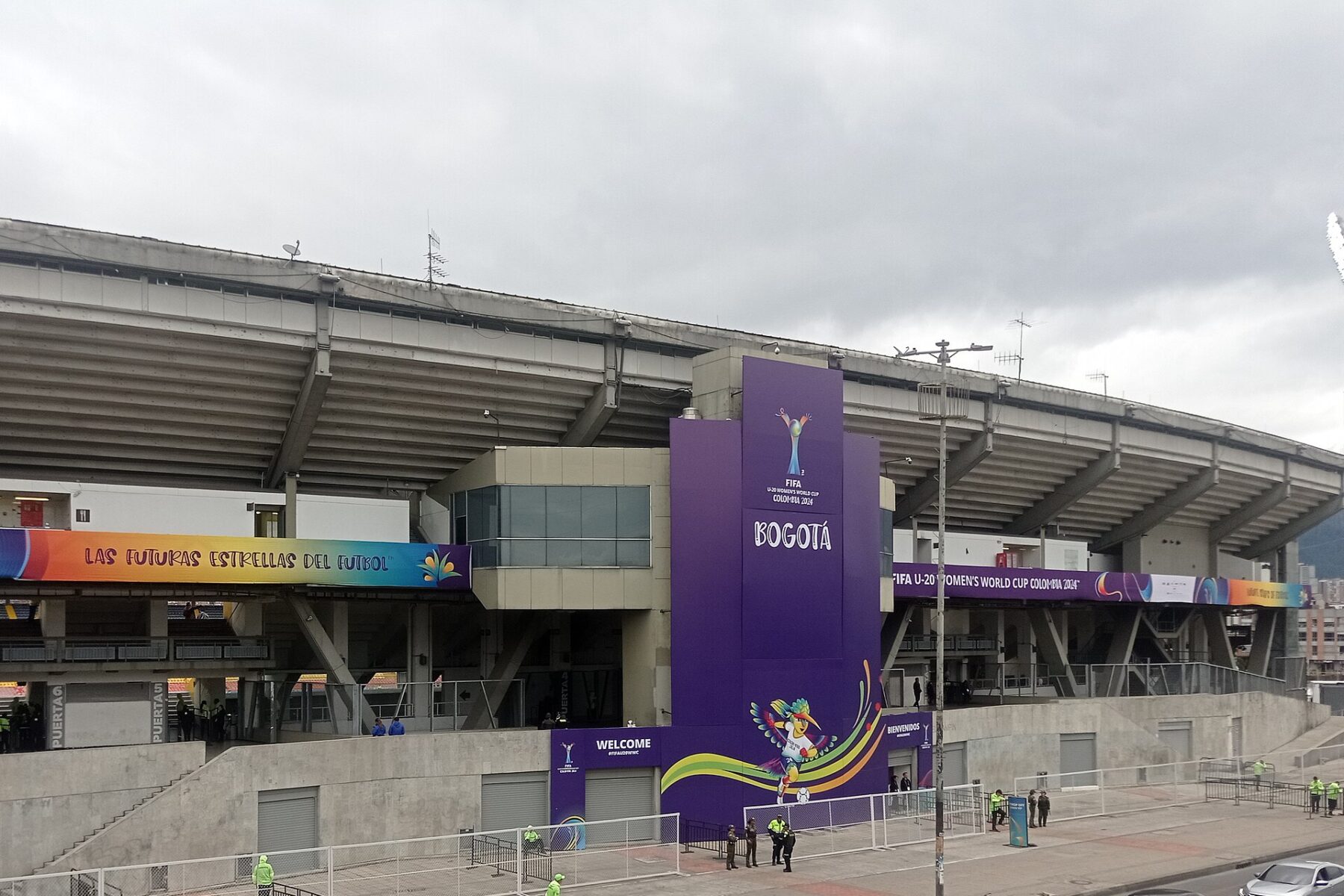Exterior of a stand at Estadio El Campín in Bogotá, Colombia, with tournament banners in 2024