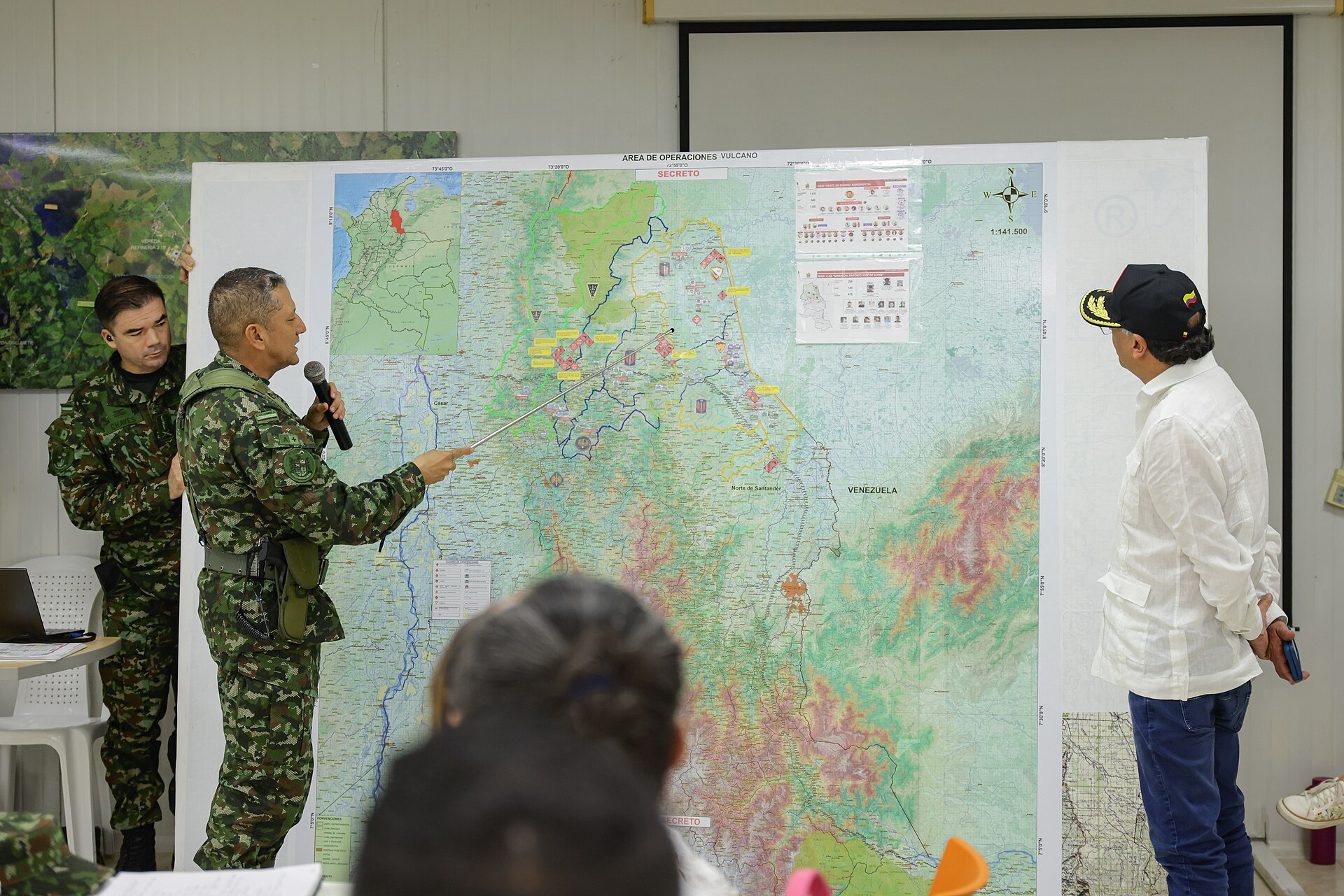 A Colombian army officer points to a map of Norte de Santander during a security meeting in Tib&uacute;