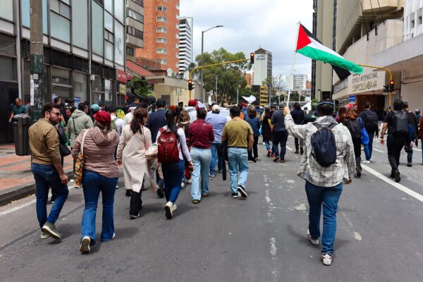 Marchers walk along a street in Bogotá during the May 2025 national strike