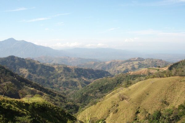Green hills and farmland in the countryside around Esparza in Puntarenas province, Costa Rica