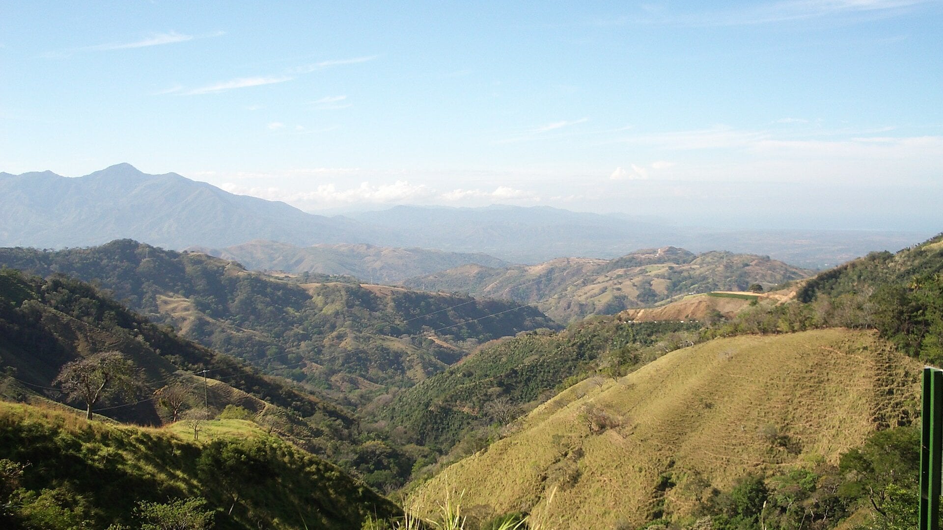 Green hills and pastures in the countryside around Esparza in Puntarenas province, Costa Rica