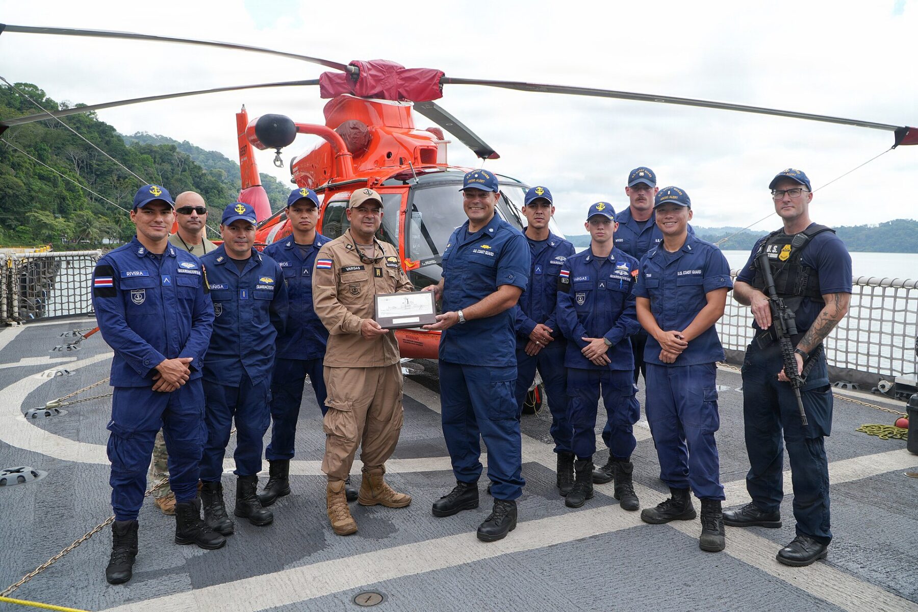 Costa Rican Coast Guard and US Coast Guard crew members aboard a US cutter in Golfito