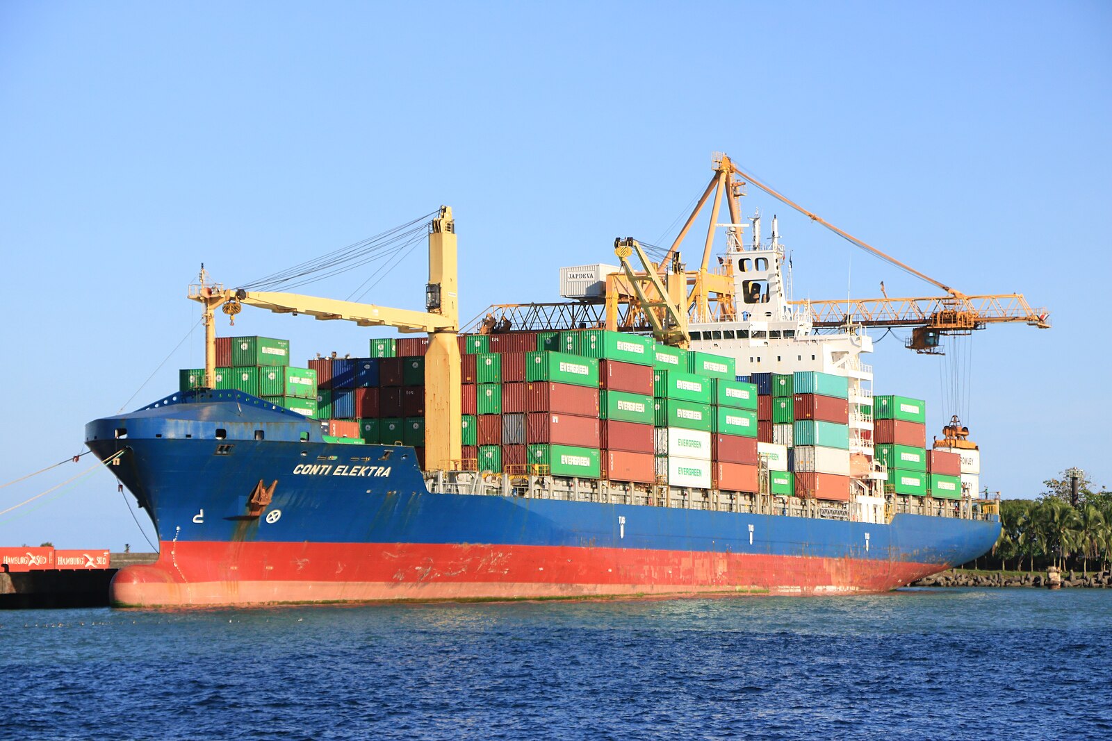 Costa Rica geopolitics and trade: a container ship loading at the Port of Moín