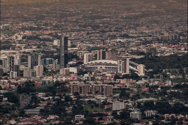 Aerial view of San José, Costa Rica, with the National Stadium and apartment towers amid the sprawling central valley