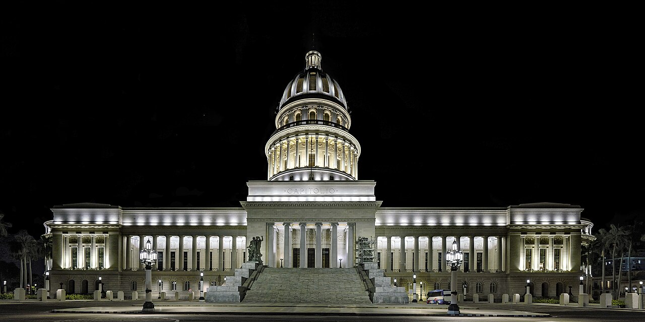 The domed Capitolio building in Havana lit up at night