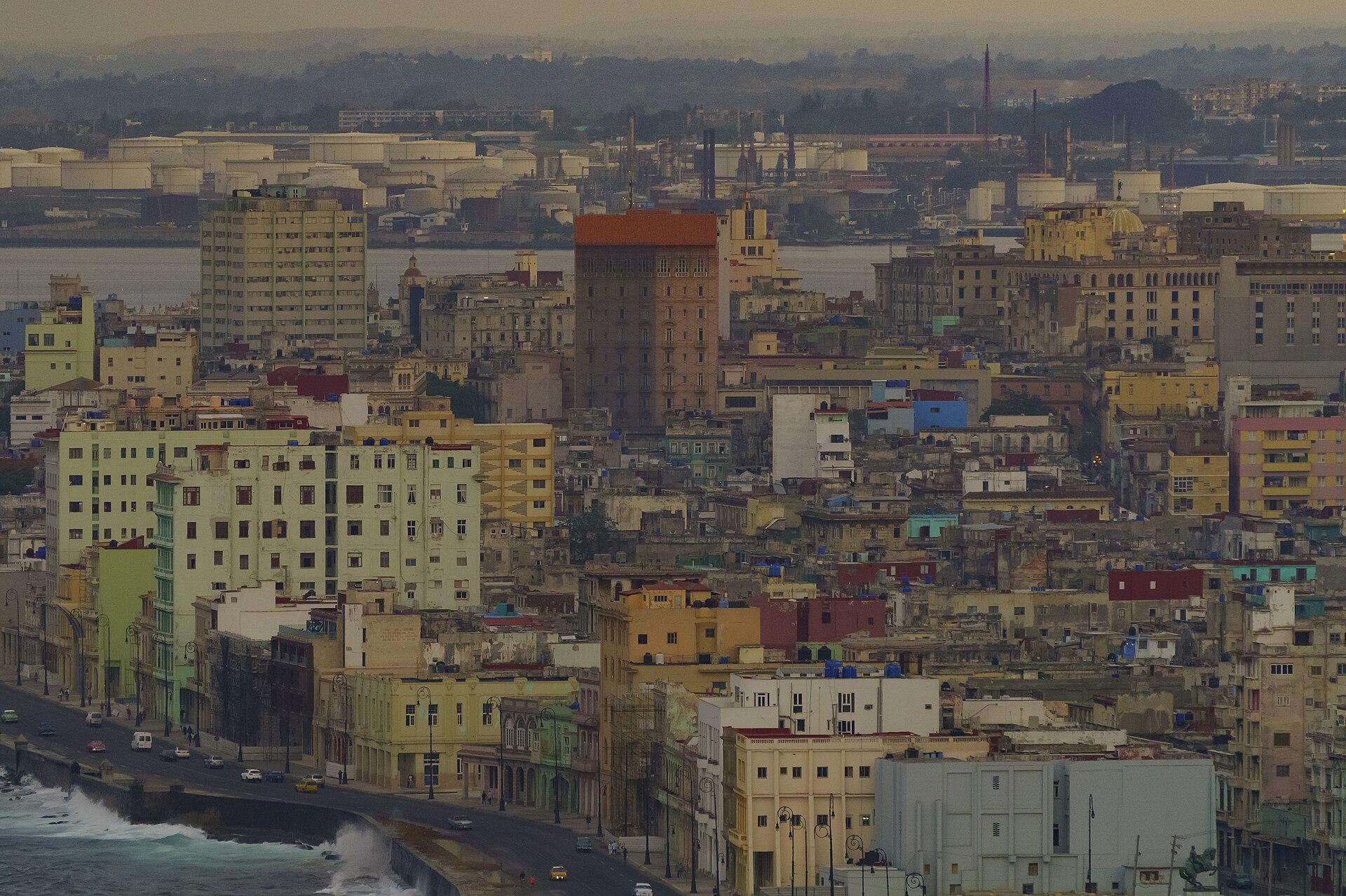 Apartment buildings of Centro Habana rising behind the Malecón seafront in Havana, Cuba