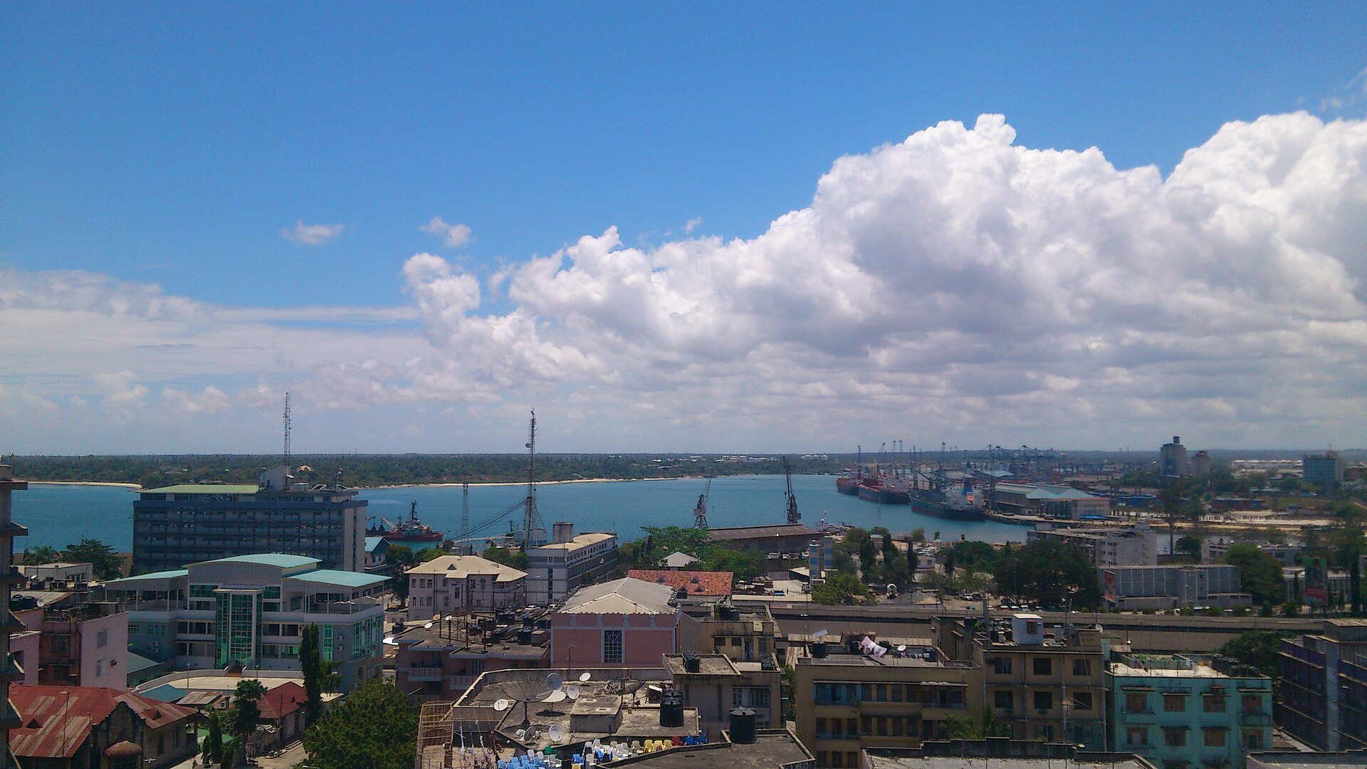 Rooftops and harbour with ships in Dar es Salaam, Tanzania
