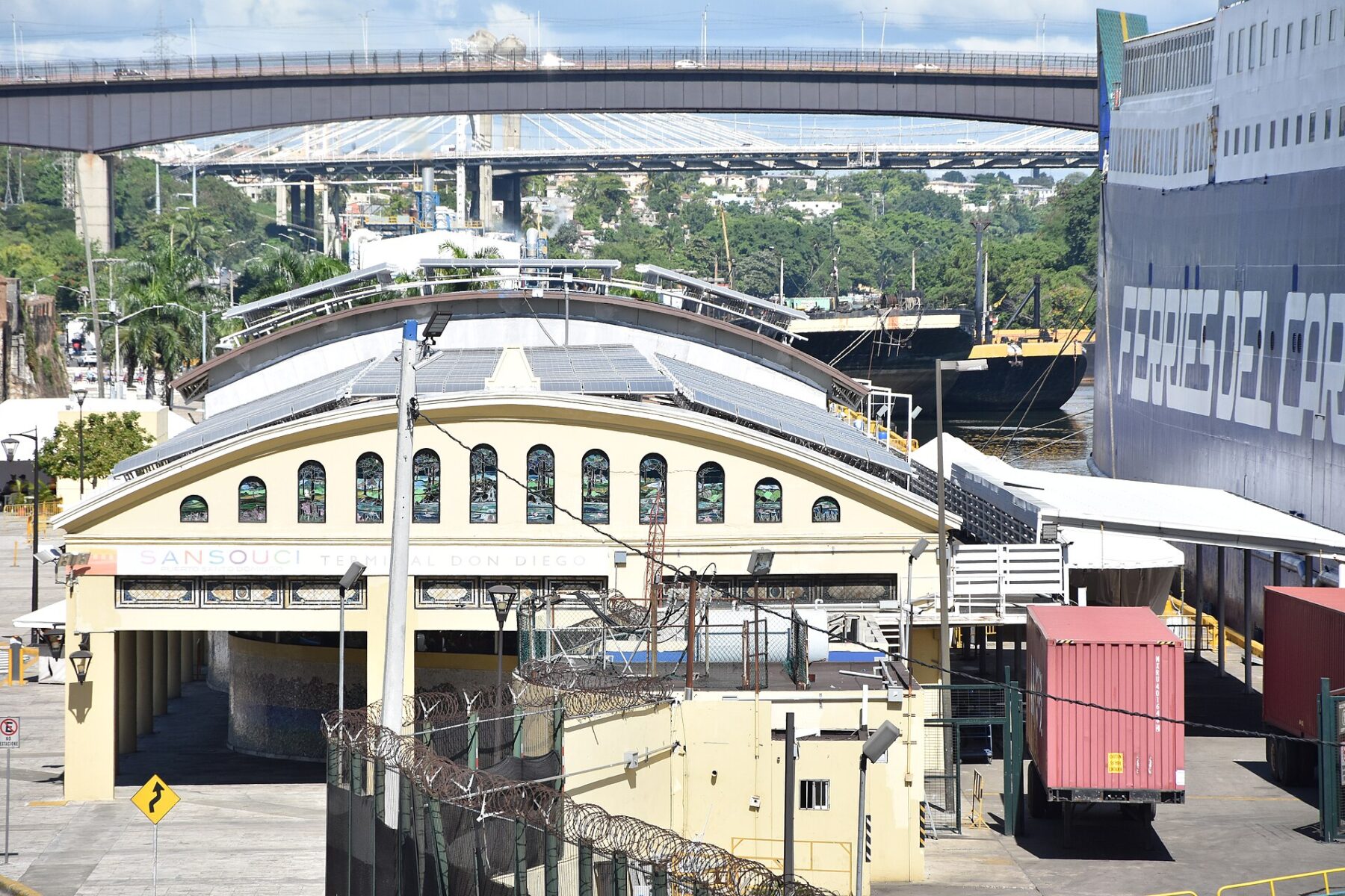 Don Diego port terminal in Santo Domingo with container trailers on the quay