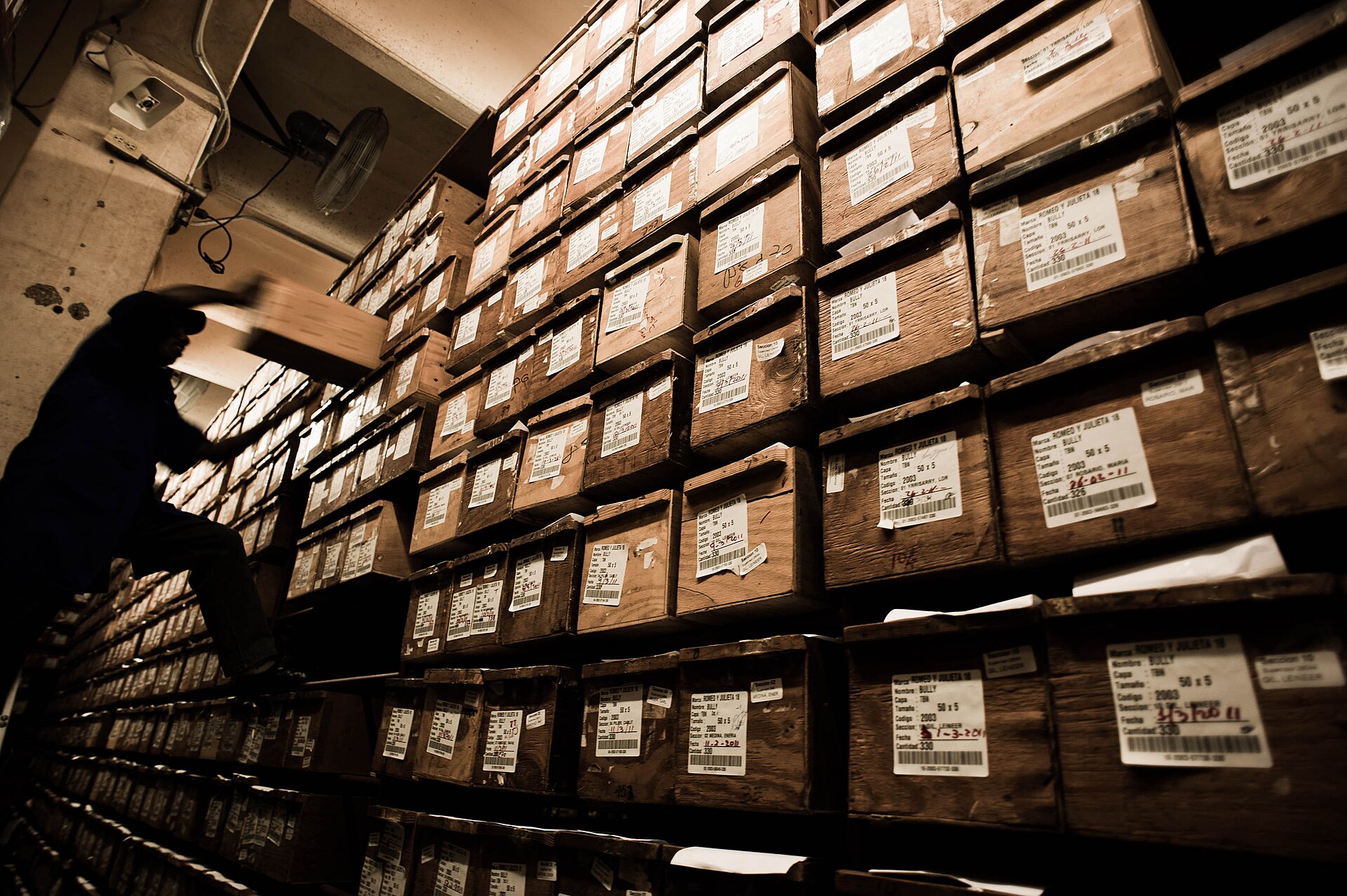 Dominican Republic economy: boxes of hand-rolled cigars stacked at a factory in La Romana