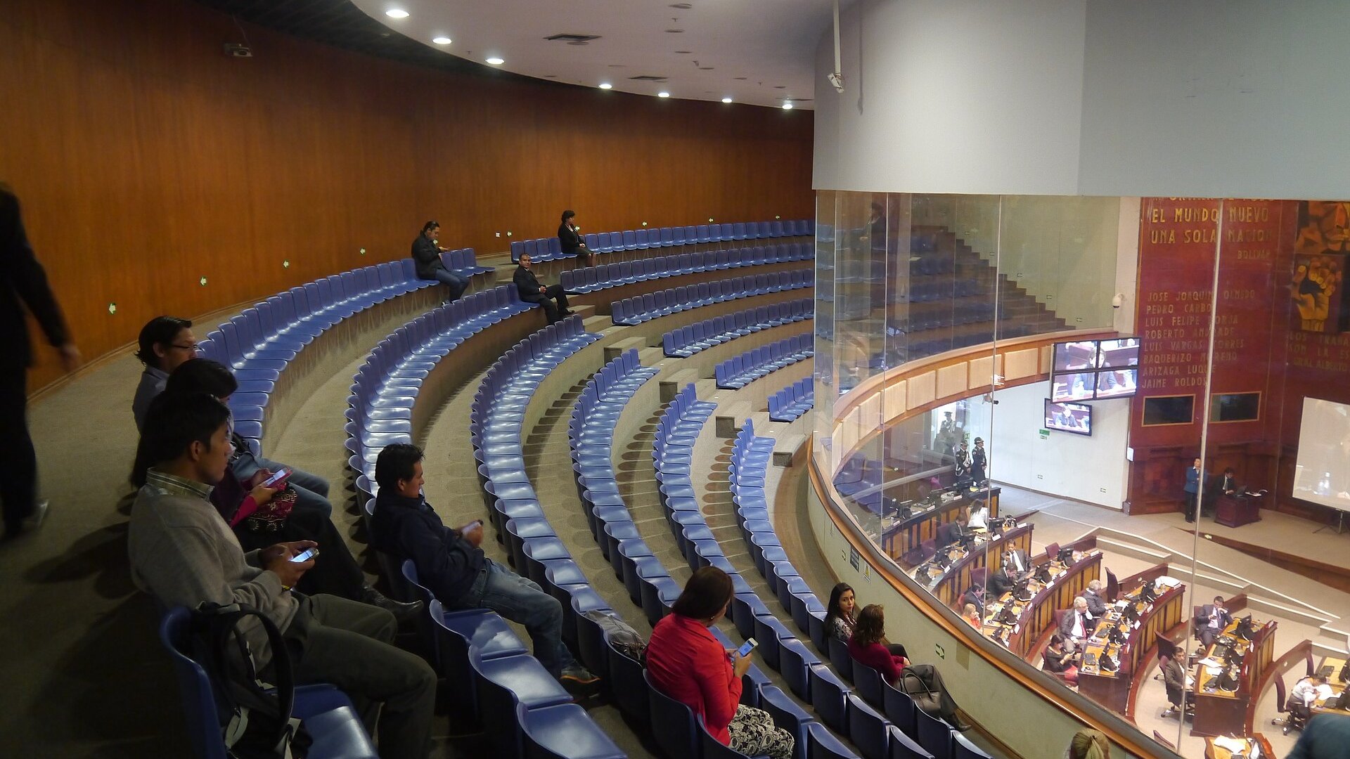 Public gallery above the plenary hall of Ecuador's National Assembly in Quito with legislators at their desks