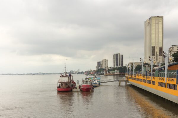 Boats moored by the Malecón 2000 riverfront on the Guayas River in Guayaquil, Ecuador