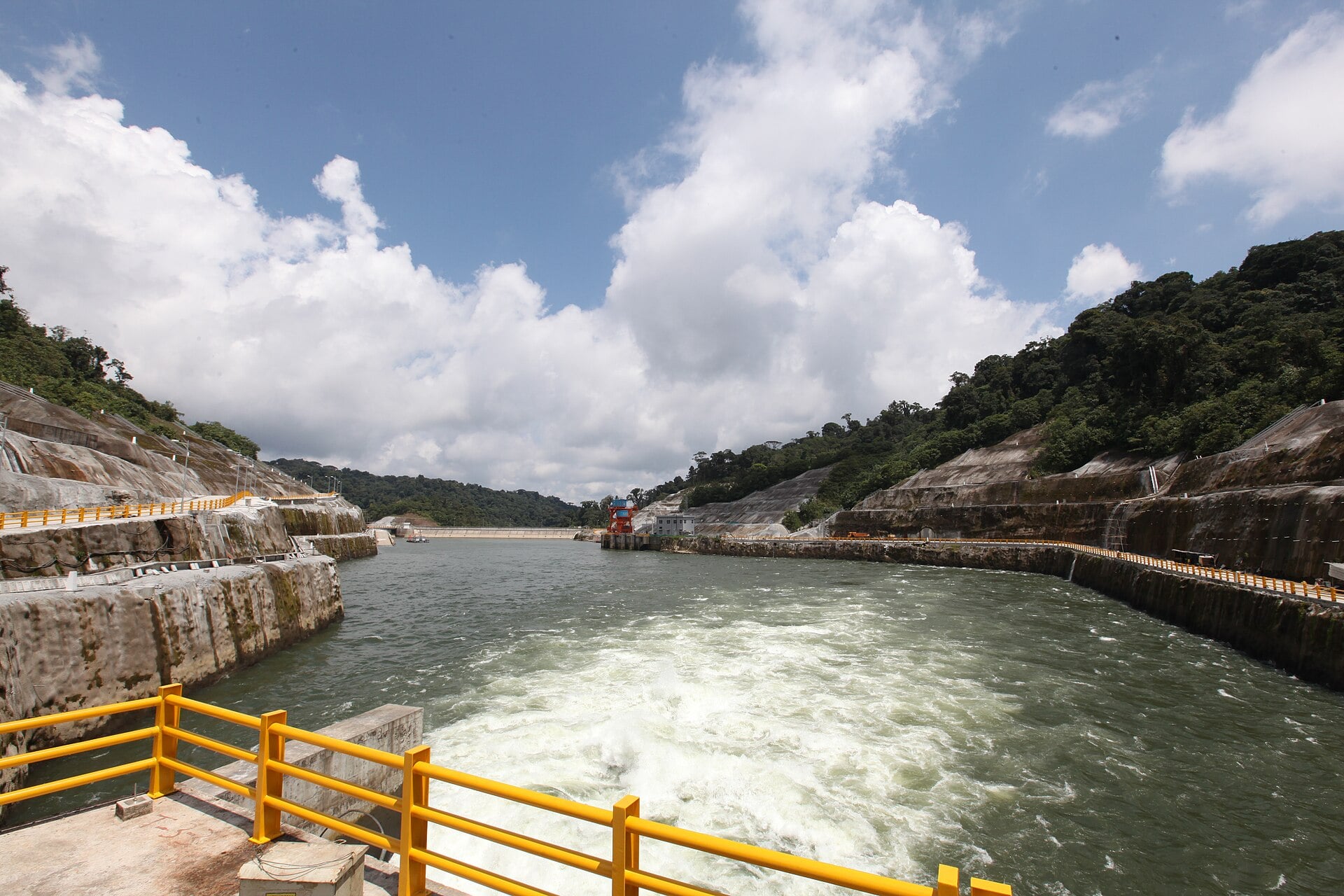 Water in the intake basin of the Coca Codo Sinclair hydroelectric plant in Ecuador under a cloudy sky