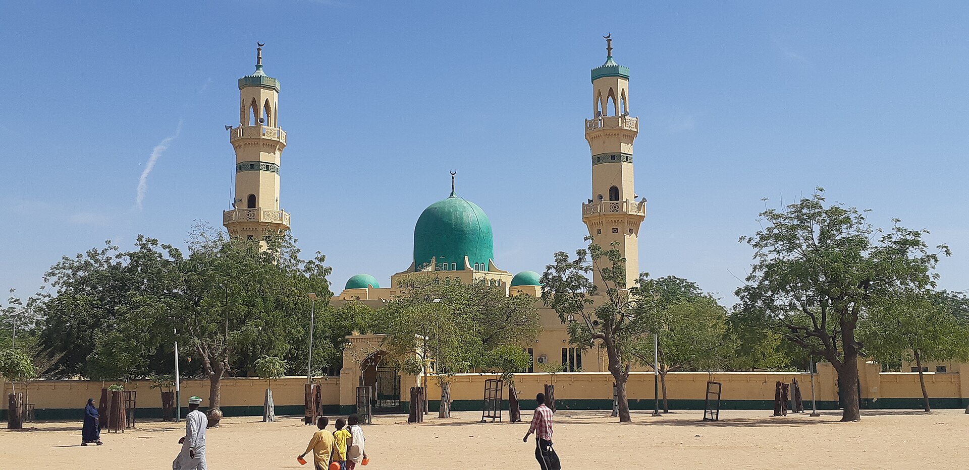 The Kano Central Mosque with two minarets and a green dome