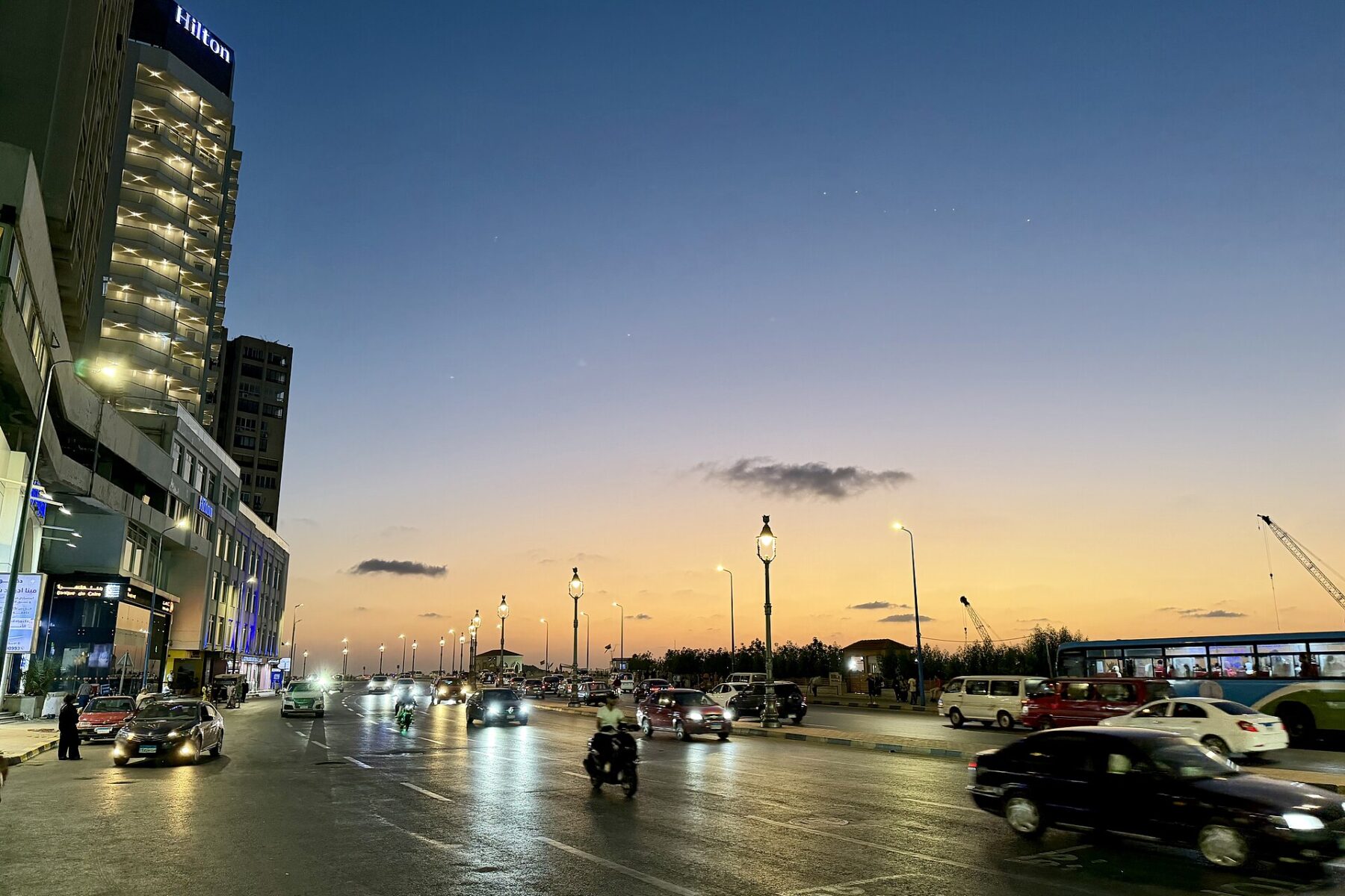 File photo of Alexandria's Corniche at dusk on Egypt's Mediterranean coast; the summit itself is at New Alamein, about 100 km to the west