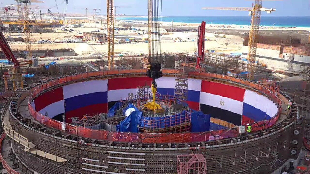 Egyptian and Russian flags painted inside the circular reactor building under construction at the El-Dabaa nuclear plant on Egypt's Mediterranean coast
