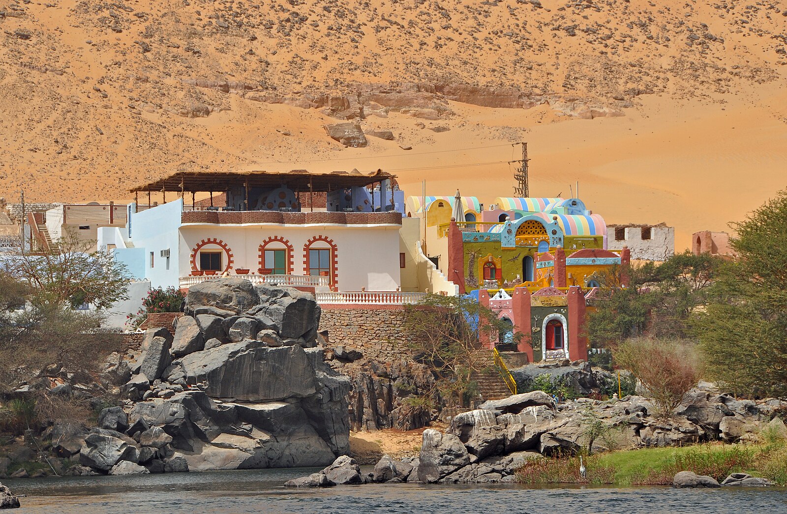 Painted Nubian houses in Naj Suhayl Gharb on the Nile near Aswan, home to part of the Egypt population of Nubian descent